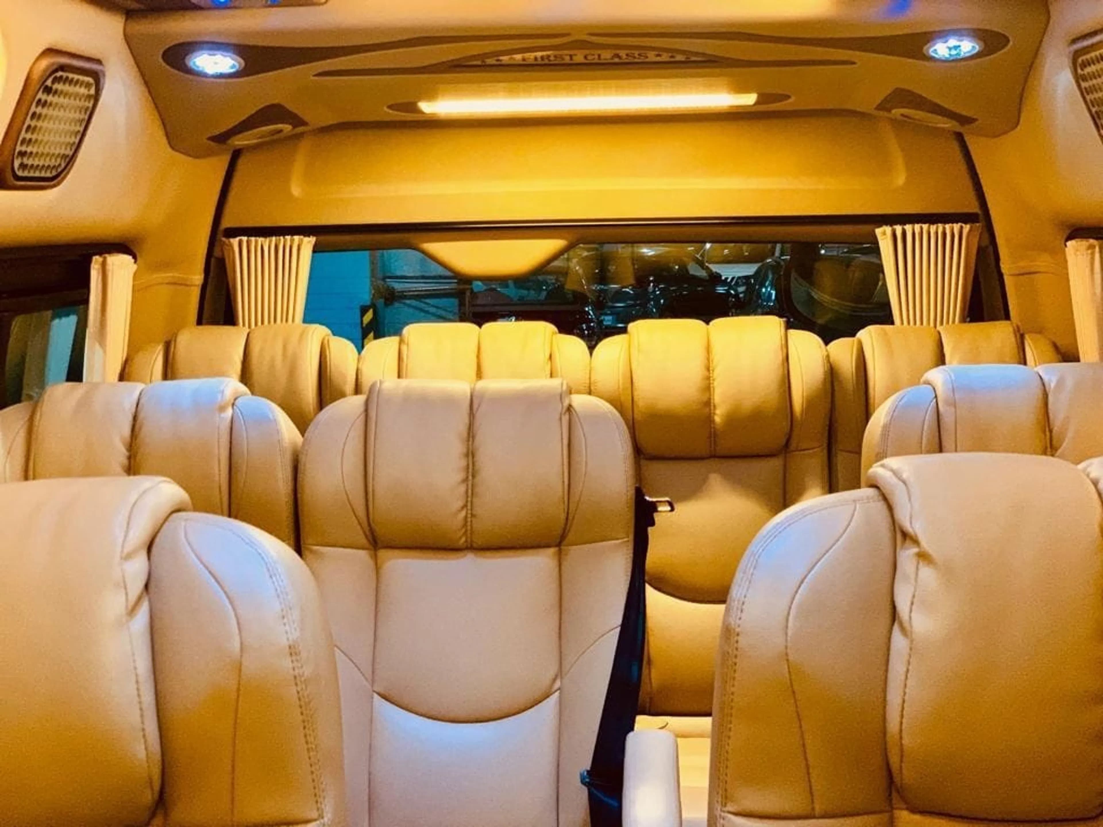 What Are the Features of a Luxury Minibus with Push-Back Seats?